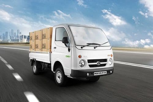 Tata ACE Gold CNG Plus front three-quarter view - loaded cargo highway promotional mini truck India 2026 Tata ACE Gold CNG Plus front three-quarter view - loaded cargo highway promotional mini truck India 2026