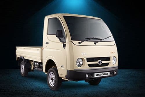 Tata ACE Gold front three-quarter view - beige colour empty flatbed mini truck India 2026 Tata ACE Gold front three-quarter view - beige colour empty flatbed mini truck India 2026
