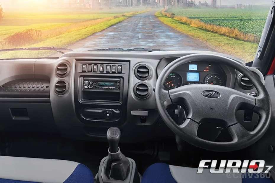 Ergonomic dashboard with comfortable steering wheel design Ergonomic dashboard with comfortable steering wheel design