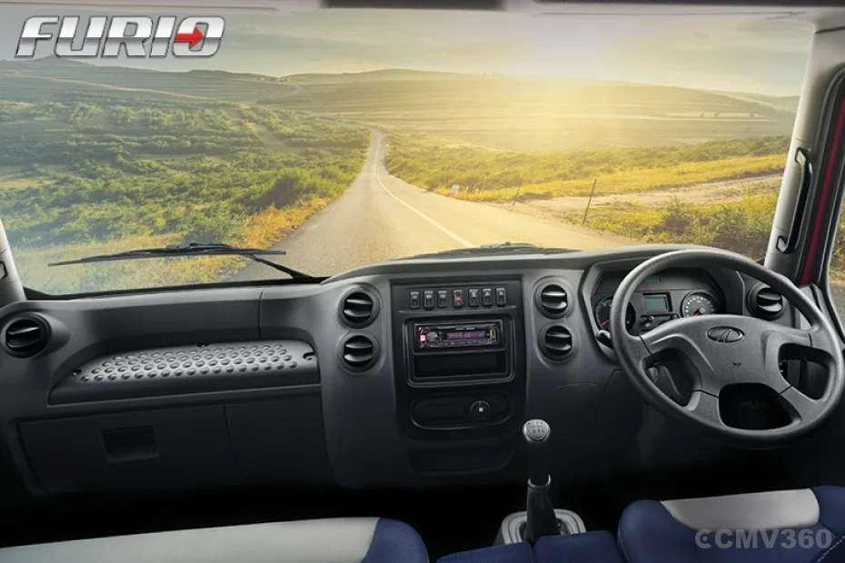 Spacious cabin with wide windshield for better visibility Spacious cabin with wide windshield for better visibility
